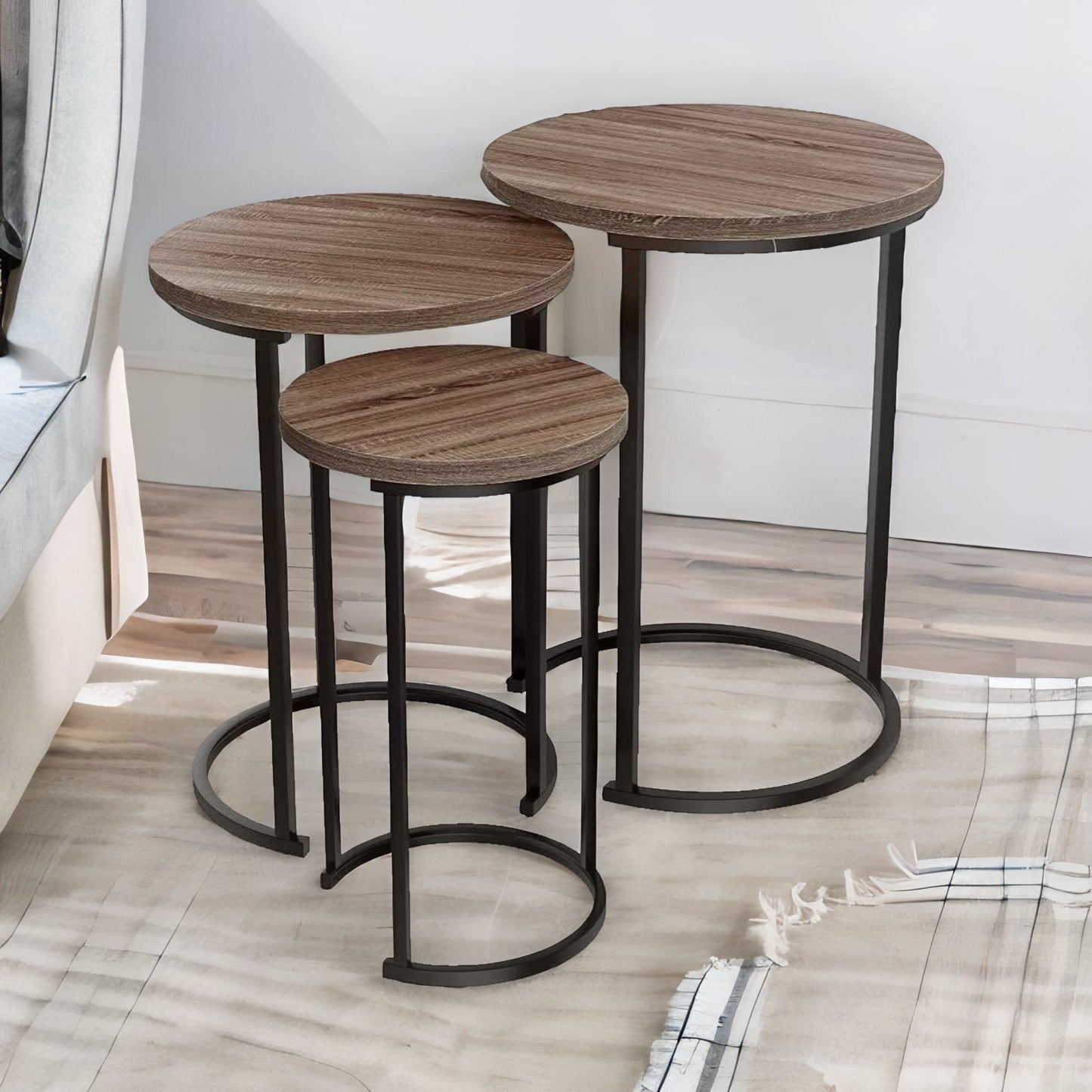 set of 3 round wooden nesting tables brown